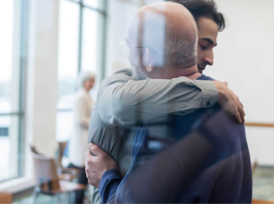Family members hugging